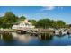 Waterfront restaurant and marina with a dock for boats, surrounded by trees, and overlooking calm water at 1439 Nokota Dr., Conway, SC 29526