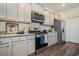 Stylish kitchen with granite countertops, stainless steel appliances, and ample cabinet space at 1447 Nokota Dr., Conway, SC 29526