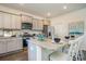 Bright kitchen featuring a center island with seating and stainless steel appliances at 1447 Nokota Dr., Conway, SC 29526