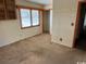Bedroom with natural light from windows and orange trim, along with some built-in shelves at 1504 Chester St., Myrtle Beach, SC 29577