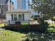 Exterior image of the home showing the wooden deck and lawn area at 1504 Chester St., Myrtle Beach, SC 29577
