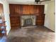 Living room featuring a fireplace and built-in bookshelves at 1504 Chester St., Myrtle Beach, SC 29577