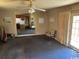 Features a ceiling fan and a doorway to a kitchen at 1504 Chester St., Myrtle Beach, SC 29577