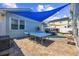 Entertainer's backyard features a ping pong table, patio with string lights and BBQ grill at 1512 S Ocean Blvd., North Myrtle Beach, SC 29582