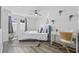 Light-filled bedroom featuring a desk, windows, and neutral decor at 1512 S Ocean Blvd., North Myrtle Beach, SC 29582