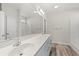 Bathroom featuring double sinks, a large mirror, and modern fixtures at 1513 Anne St., North Myrtle Beach, SC 29582