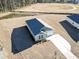 Aerial view of the home with a pristine roof and manicured lawn, near a tranquil pond at 154 Seasons Trace Loop, Longs, SC 29568