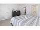 Bedroom showcasing a dresser and closet door with a view to the bathroom at 154 Seasons Trace Loop, Longs, SC 29568