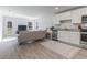 Open-concept living space combines the living room and kitchen for easy living and entertaining at 154 Seasons Trace Loop, Longs, SC 29568