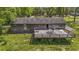 The backyard features a large wooden deck with rustic home siding, perfect for entertaining and outdoor relaxation at 1651 Weldon Ln., Conway, SC 29526