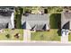 Single-Gathering home with a large lawn and mature landscaping at 180 Oak Crest Circle, Longs, SC 29568