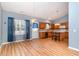 Open-concept kitchen with ample counter space, breakfast bar, and an adjacent dining area at 180 Oak Crest Circle, Longs, SC 29568