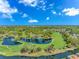 Scenic aerial shot showcasing a golf course community with lush greenery and serene lakes in a tranquil setting at 1801 N Ocean Blvd. # A4, North Myrtle Beach, SC 29582