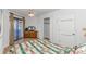 Bright bedroom featuring a sliding glass door to a balcony and a ceiling fan at 1801 N Ocean Blvd. # A4, North Myrtle Beach, SC 29582