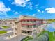 Waterfront condo building with multiple floors, balconies, and covered parking; showcasing views at 1801 N Ocean Blvd. # A4, North Myrtle Beach, SC 29582