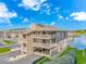 Waterfront condo building with multiple floors, balconies, and covered parking; showcasing views at 1801 N Ocean Blvd. # A4, North Myrtle Beach, SC 29582
