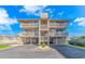 Inviting multi-story beach condo with covered parking and private balconies offering stunning ocean views at 1801 N Ocean Blvd. # A4, North Myrtle Beach, SC 29582