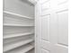Spacious walk-in pantry with ample shelving for organized storage of food items and household goods at 1801 N Ocean Blvd. # A4, North Myrtle Beach, SC 29582
