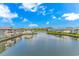 Scenic waterfront condos overlooking a serene waterway with lush landscaping and clear blue skies at 1801 N Ocean Blvd. # A4, North Myrtle Beach, SC 29582