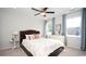 Cozy bedroom featuring a queen bed with floral bedding and natural light from two windows at 1804 Hardwood Ct., Conway, SC 29526