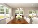Dining room with large windows that let in plenty of natural light and neutral decor at 1804 Hardwood Ct., Conway, SC 29526