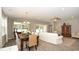 Open-concept dining room that is light and bright and features modern furnishings and decor at 1804 Hardwood Ct., Conway, SC 29526