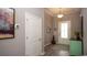 Inviting foyer showcasing wood-look tile flooring, neutral walls, and attractive decor at 1804 Hardwood Ct., Conway, SC 29526
