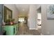 Spacious foyer leads to an open-concept living area, featuring tile flooring and natural light at 1804 Hardwood Ct., Conway, SC 29526