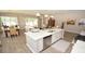 Kitchen with a large island and stainless steel appliances, open to the dining and living areas at 1804 Hardwood Ct., Conway, SC 29526