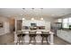 Kitchen with a large island with a breakfast bar featuring granite countertops and stainless steel appliances at 1804 Hardwood Ct., Conway, SC 29526
