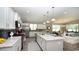 Modern kitchen with stainless steel appliances, granite countertops, and an island with bar seating at 1804 Hardwood Ct., Conway, SC 29526