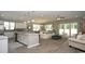 Open concept living space featuring a modern kitchen, dining area, and comfortable living room at 1804 Hardwood Ct., Conway, SC 29526