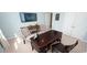 Office space with a dark desk, two patterned chairs, and a wall mounted tv at 1804 Hardwood Ct., Conway, SC 29526