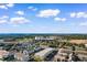 Wide aerial shot showcasing the property's location with surrounding greenery and community features at 191 Maison Dr. # B-319, Myrtle Beach, SC 29572