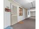 Condo hallway with B-319 signage to 