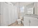 Well-maintained bathroom with shower, toilet, and granite vanity providing essential amenities at 201-F Madison Ct., Myrtle Beach, SC 29577