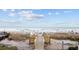 Scenic boardwalk leading to a beautiful beach with people enjoying the ocean views at 201-F Madison Ct., Myrtle Beach, SC 29577