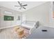 Inviting bedroom with a daybed, desk, ceiling fan, and cozy decor for a relaxing stay at 201-F Madison Ct., Myrtle Beach, SC 29577