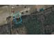 Aerial view of a vacant lot surrounded by trees and other homes in the neighborhood at 204 Shady Pines Ct., Conway, SC 29527