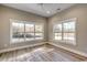 Bedroom featuring a neutral color palette, wood-look floors and large windows for natural light at 204 Shady Pines Ct., Conway, SC 29527