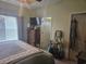 Comfortable bedroom featuring neutral walls, natural light and standard closet at 213 Cupola Dr., Longs, SC 29568