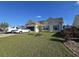 Charming one-story home with well-maintained lawn and beautiful blue shutters at 213 Cupola Dr., Longs, SC 29568