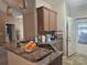 Kitchen area featuring ample counter space and sink with a view through the door at 213 Cupola Dr., Longs, SC 29568