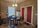 Cozy eat-in kitchen area with modern table and chairs near the door at 213 Cupola Dr., Longs, SC 29568