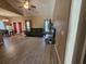 Spacious living room showcasing laminate floors, an open floor plan and access to the kitchen at 213 Cupola Dr., Longs, SC 29568