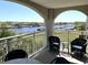 Balcony with seating that overlooks a waterway and marina view in Grande Dunes, Myrtle Beach, SC at 2151 Bridgeview Ct. # 3-305, North Myrtle Beach, SC 29582