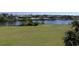 View of waterfront homes surrounded by lush trees offering tranquil water views at 2151 Bridgeview Ct. # 3-305, North Myrtle Beach, SC 29582