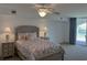Inviting main bedroom with ceiling fan and access to a private balcony providing ample space at 2151 Bridgeview Ct. # 3-305, North Myrtle Beach, SC 29582