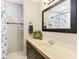 Well-lit bathroom with modern vanity, nautical décor, and a clean, stylish design at 220 Clubhouse Dr. # 20B, Sunset Beach, NC 28468