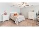 Cozy bedroom with neutral colors and seashell bedding, creating a relaxing and inviting space at 220 Clubhouse Dr. # 20B, Sunset Beach, NC 28468